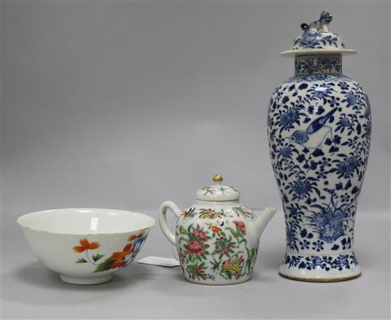 A Chinese blue and white vase and cover, a small canton teapot and a polychrome-decorated bowl